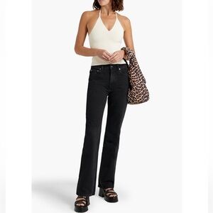 GANNI Betzy High Rise Jeans in Washed Black.
